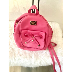 Pink mini backpack purse with bow synthetic leather